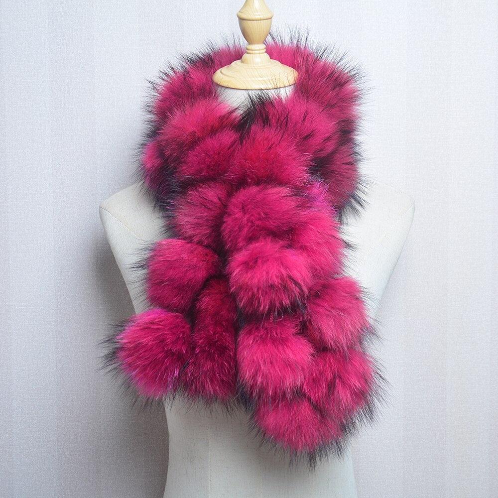 Écharpe en fausse fourrure aux pompons extravagants