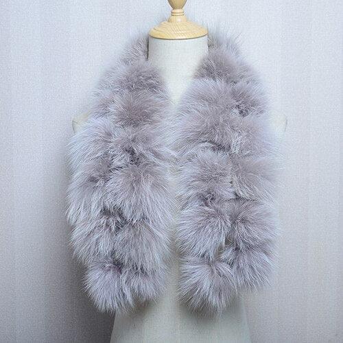 Écharpe en fausse fourrure aux pompons extravagants Beige