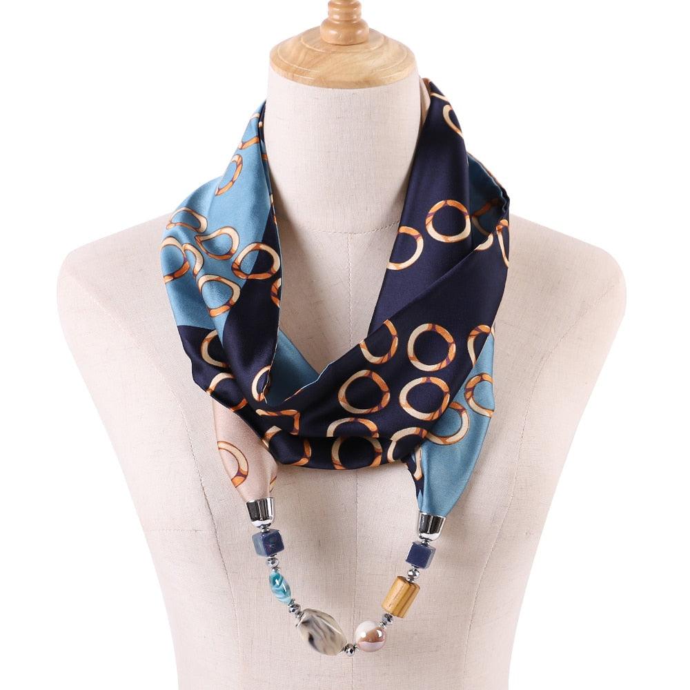 Foulard bijou élégant avec perle et cercle doré bleu