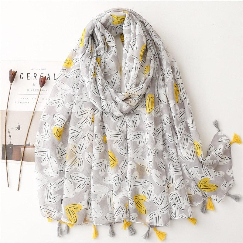 Foulard en coton gris et jaune avec motif cœur abstrait